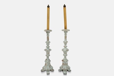 Lot 131 - A pair of painted wood candlesticks