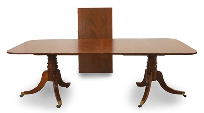 Lot 508 - A twin-pedestal mahogany dining table