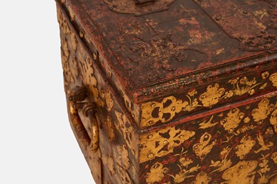 Lot A painted and parcel-gilt wooden and cast iron strongbox