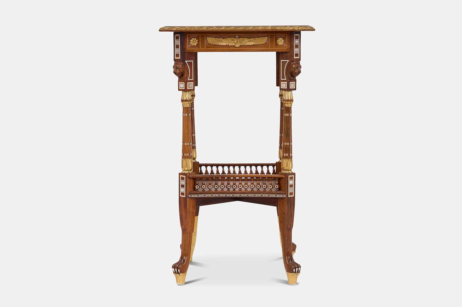 Lot 73 - An Egyptian Revival kingwood and parcel-gilt occasional table attributed to Johnstone, Norman & Co.