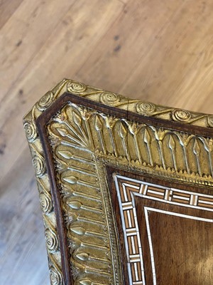 Lot 73 - An Egyptian Revival kingwood and parcel-gilt occasional table attributed to Johnstone, Norman & Co.