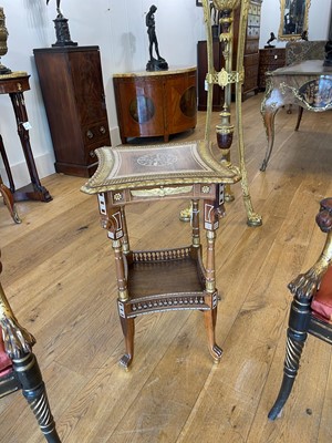 Lot 73 - An Egyptian Revival kingwood and parcel-gilt occasional table attributed to Johnstone, Norman & Co.