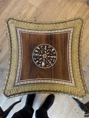 Lot 73 - An Egyptian Revival kingwood and parcel-gilt occasional table attributed to Johnstone, Norman & Co.