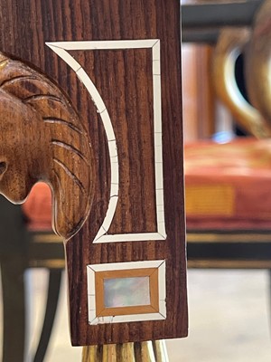 Lot 73 - An Egyptian Revival kingwood and parcel-gilt occasional table attributed to Johnstone, Norman & Co.
