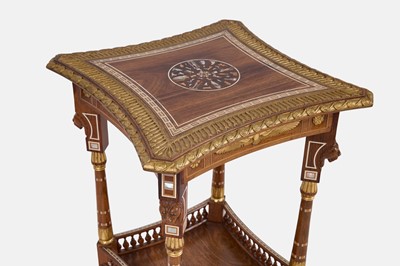 Lot 73 - An Egyptian Revival kingwood and parcel-gilt occasional table attributed to Johnstone, Norman & Co.