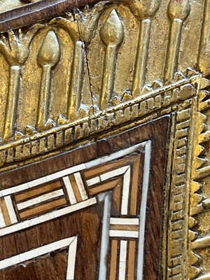 Lot 73 - An Egyptian Revival kingwood and parcel-gilt occasional table attributed to Johnstone, Norman & Co.