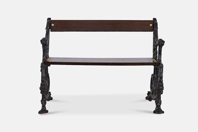 Lot 417 - A small painted cast iron garden bench