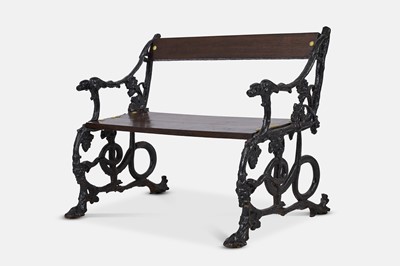 Lot 417 - A small painted cast iron garden bench