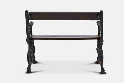 Lot 417 - A small painted cast iron garden bench