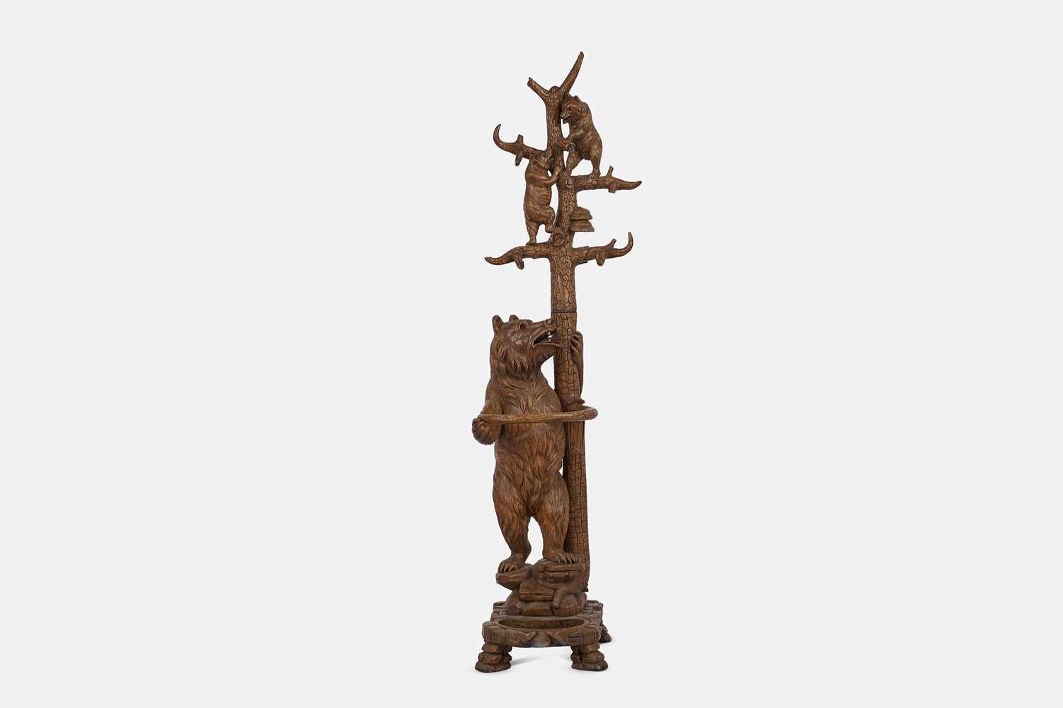 Lot 139 - A Black Forest carved wooden hall stand