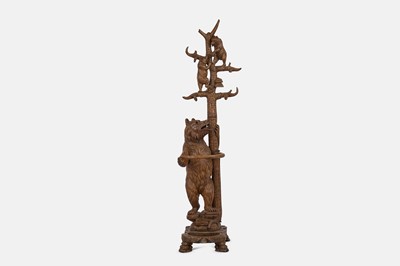 Lot 139 - A Black Forest carved wooden hall stand