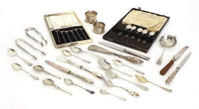 Lot 47 - A collection of silver flatware and associated items