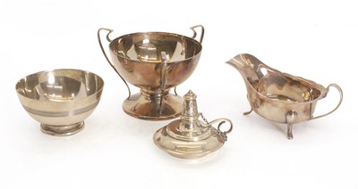 Lot 38 - A silver triple handled footed bowl