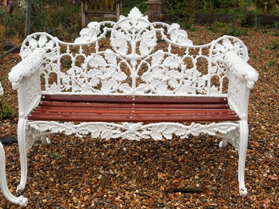 Lot 552 - A cast iron garden bench