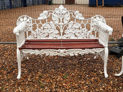 Lot 555 - A cast iron garden bench