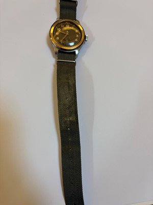 Lot 7 - A Cyma stainless steel British military-issued ‘Dirty Dozen’ mechanical wristwatch