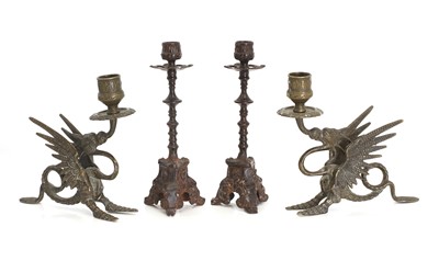 Lot 316 - A pair of dragon candlesticks
