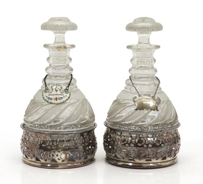 Lot 153 - A pair of cut glass decanters