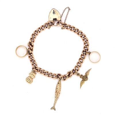 Lot 302 - A 9ct rose gold charm bracelet