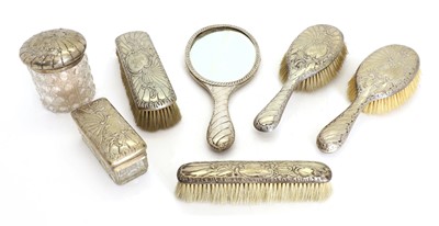 Lot 11 - A German seven piece 800 standard silver backed and mounted dressing table set