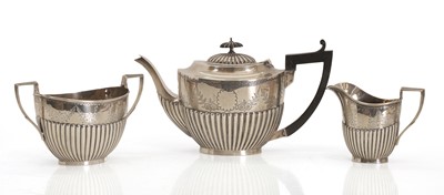 Lot 32 - A gadroon silver tea service