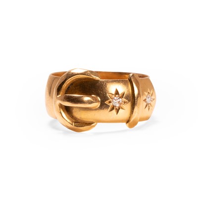 Lot 34 - An 18ct gold diamond set buckle ring
