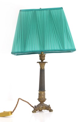 Lot 471 - A French Empire ormolu column lamp