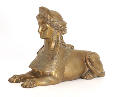Lot 302 - A brass Egyptian Revival sphinx
