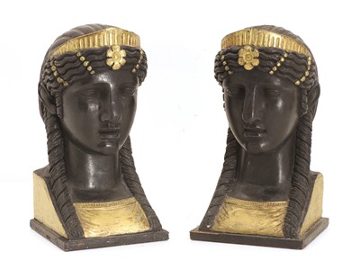 Lot 301 - A pair of wooden Egyptian Revival sphinx-head bookends