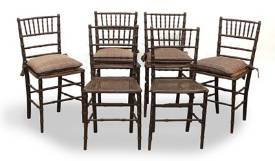Lot 501 - A set of six painted faux bamboo chairs