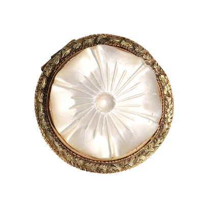 Lot 125 - A carved mother of pearl brooch