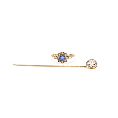 Lot 173 - A pearl and paste ring with a pearl stick pin