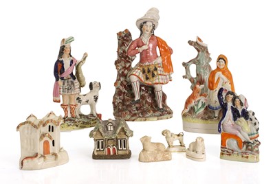 Lot 103 - Nine Staffordshire pastille burners and various figures