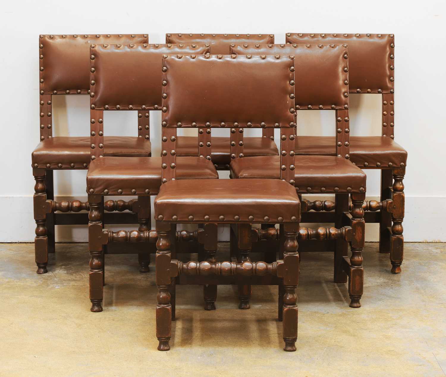 Lot 538 - A set of six oak dining chairs