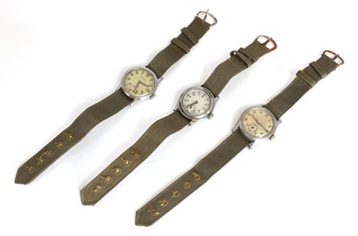 Lot 117 - Three WWII British military issue ATP mechanical wristwatches