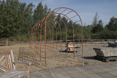 Lot 556 - A large wrought iron rose arch