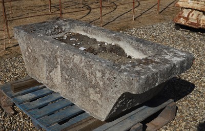 Lot 555 - A large cut stone trough