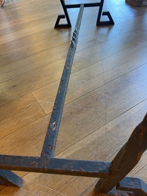 Lot 414 - An iron-framed limestone garden table