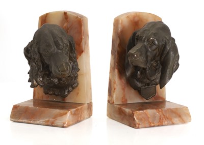 Lot 273 - A pair of spelter and onyx bookends
