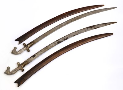 Lot 382 - A near pair of Indian talwar sabres