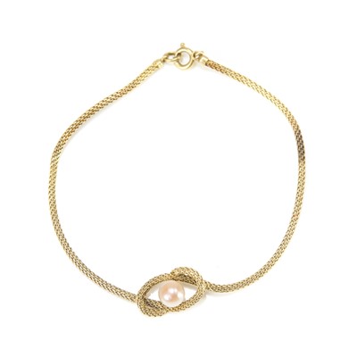 Lot 133 - A mesh link bracelet with a cultured pearl