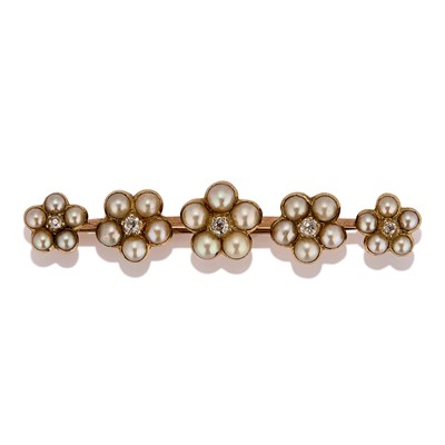 Lot 18 - A late Victorian/Edwardian split pearl and diamond bar brooch