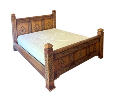 Lot 508 - An oak panelled bedstead