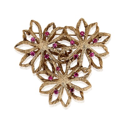 Lot 50 - A 9ct gold ruby set floral brooch