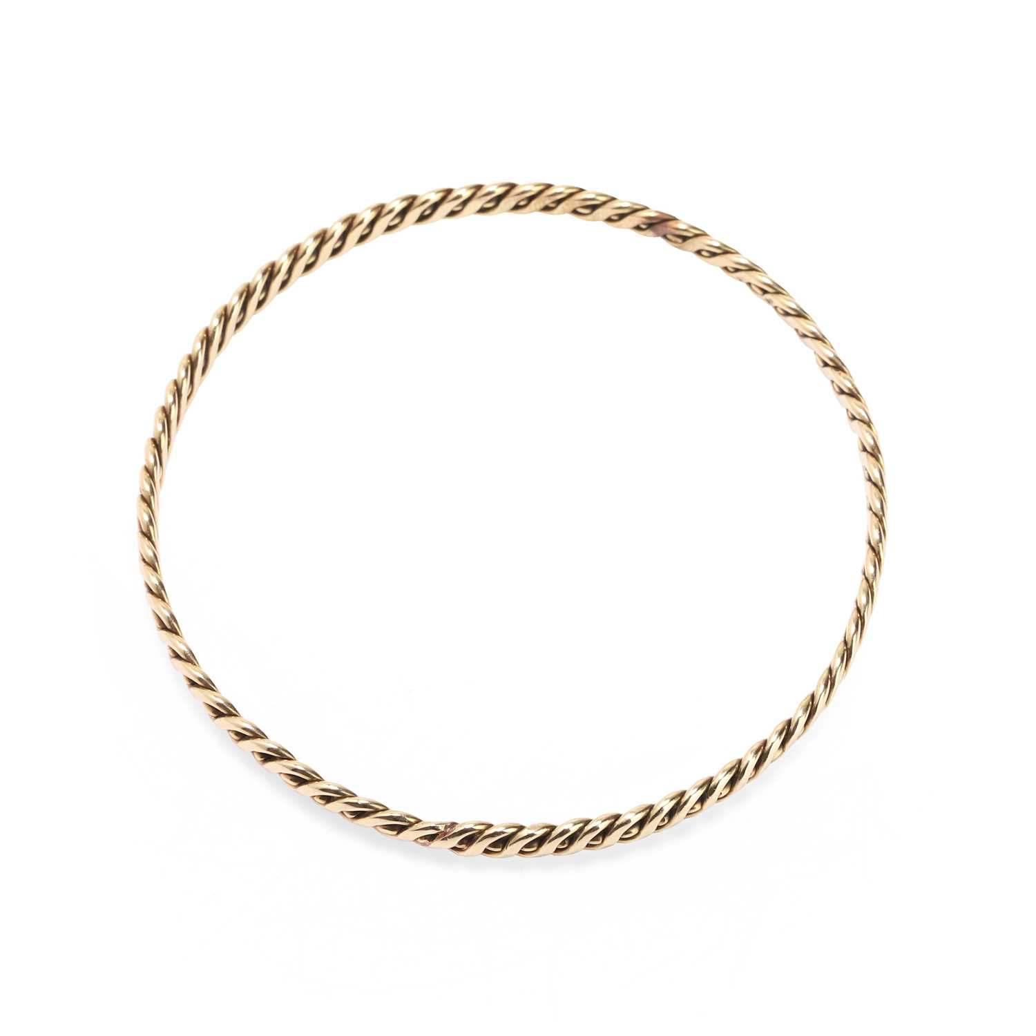 Lot 297 - A gold bangle