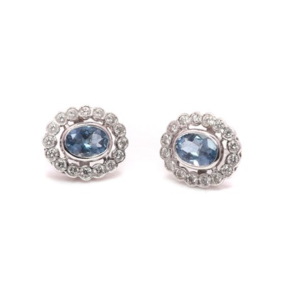 Lot 99 - A pair of 18ct white gold aquamarine and diamond stud earrings
