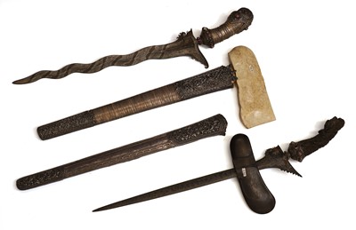 Lot 62 - Two Indonesian kris daggers with scabbards