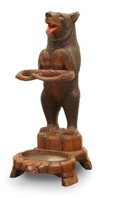 Lot 508 - A Black Forest carved bear stick stand