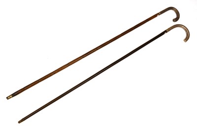 Lot 266 - Two silver-mounted walking canes