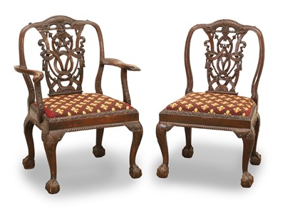 Lot 502 - A carved elbow chair and matching side chair